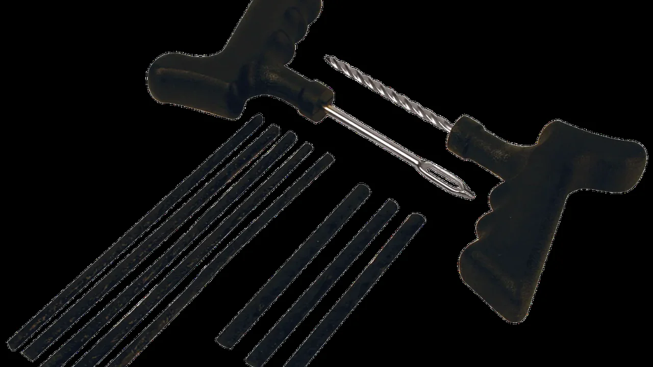 blue bowl of black bean beef tortilla soup on a board with cilantro and shredded cheese in background