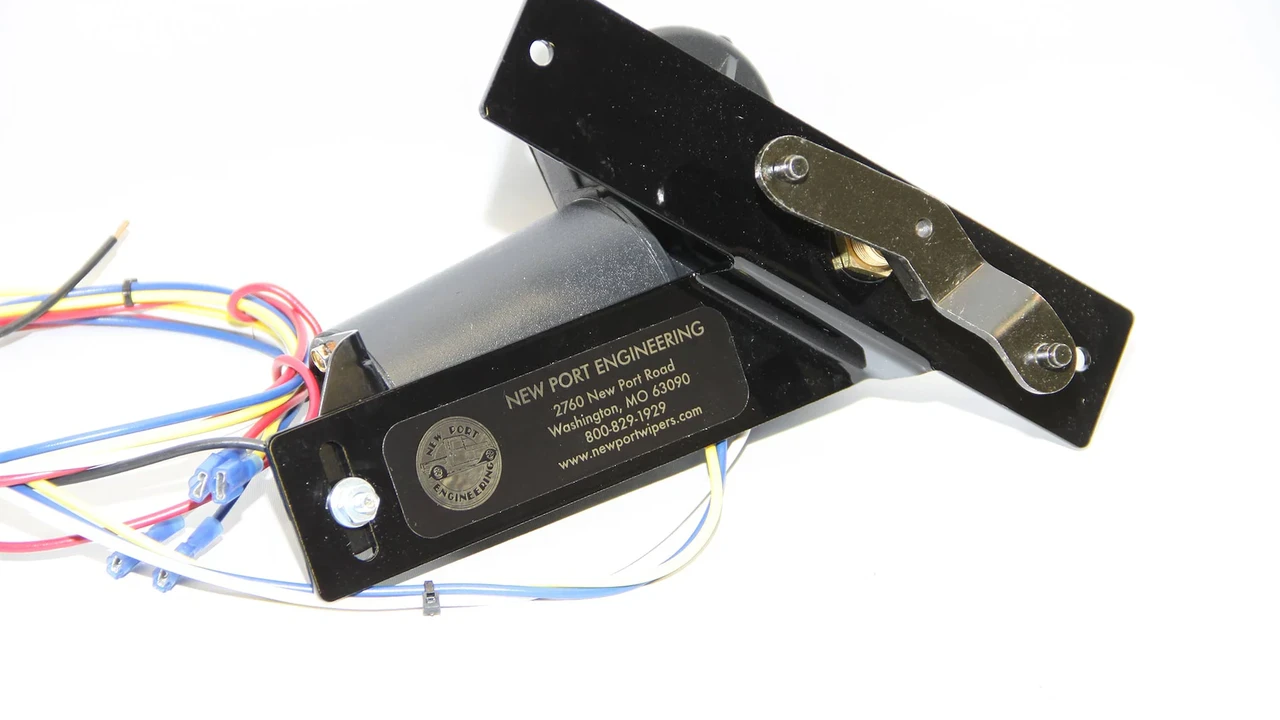 Two mint chocolate milkshakes with whipped cream and green sprinkles.