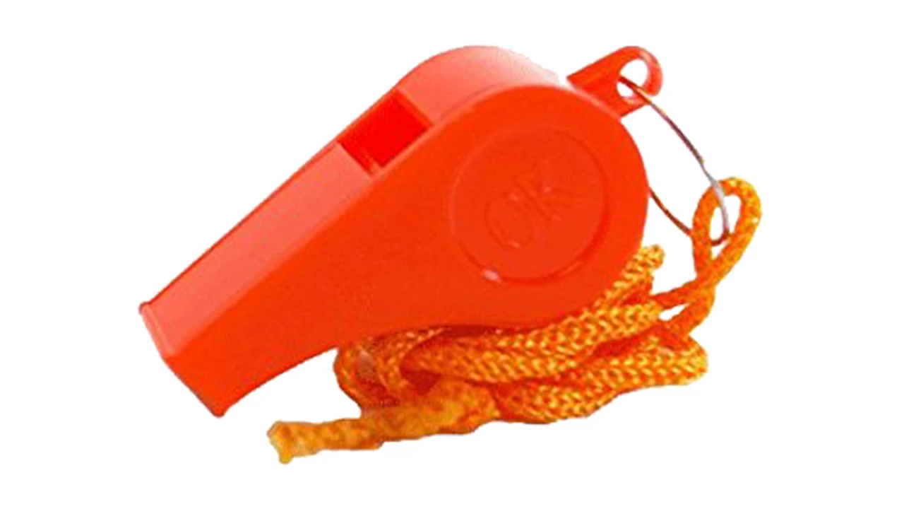 overhead view of corned beef sliced and on a platter with cabbage, potatoes, and carrots